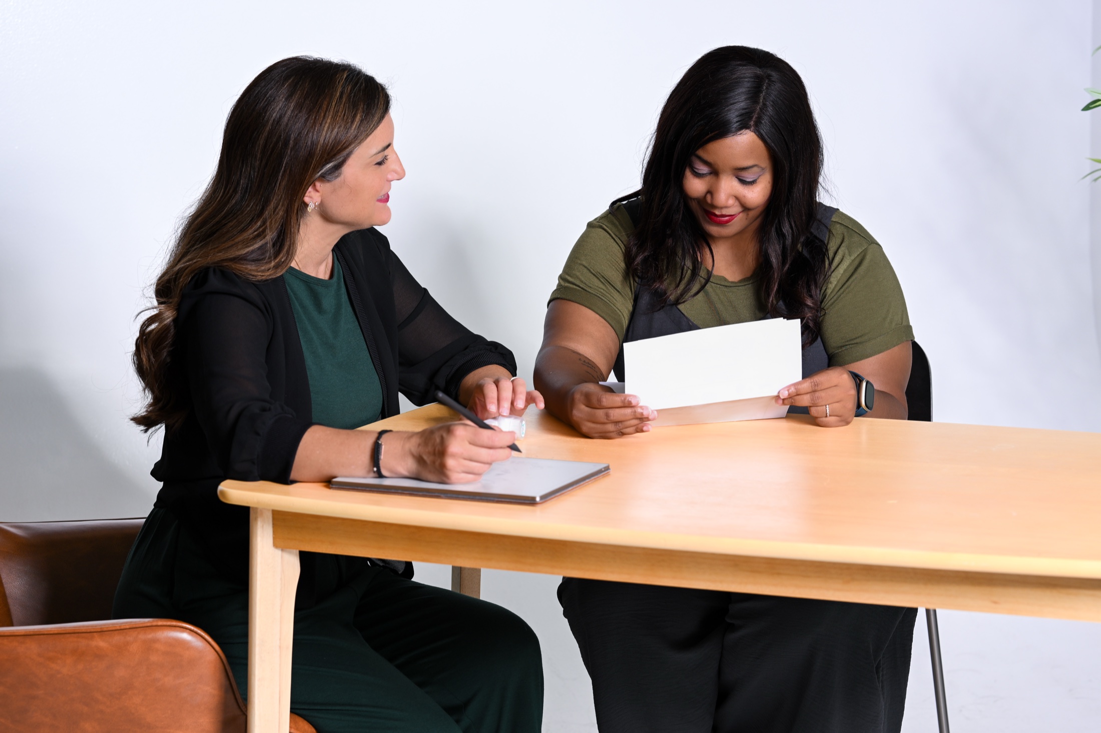 Tiffany Pulgiano reviewing health information with a patient